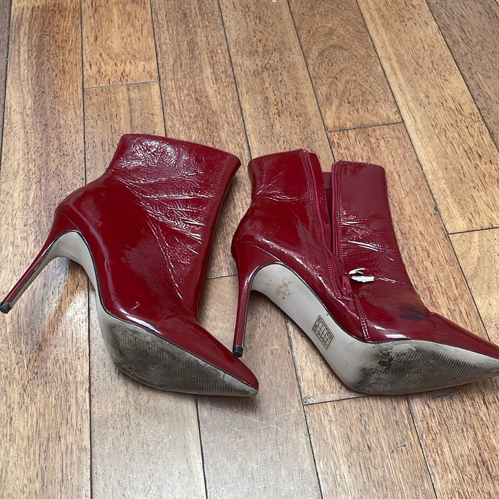 Used red healed boots